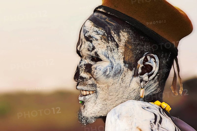 Nyangatom or Bume man with painted face
