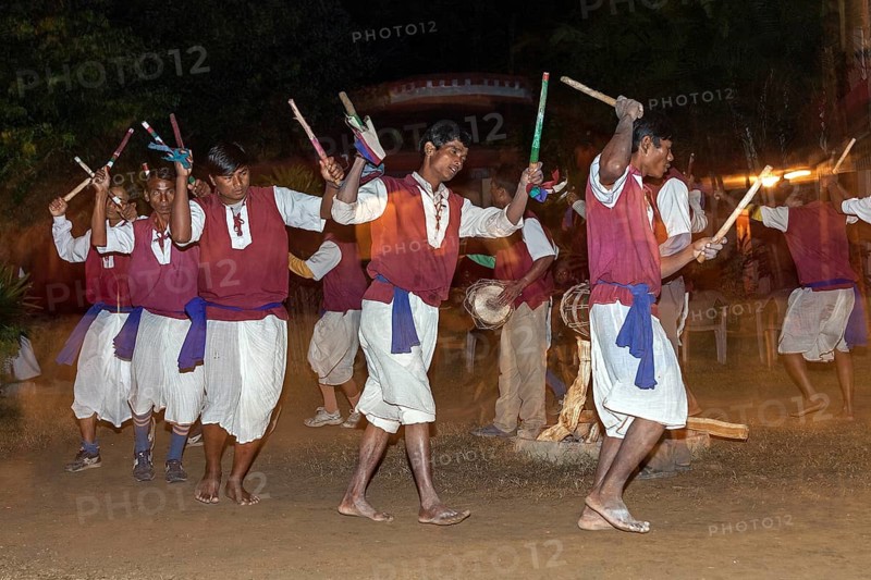 Nepalese men perform a traditional dance