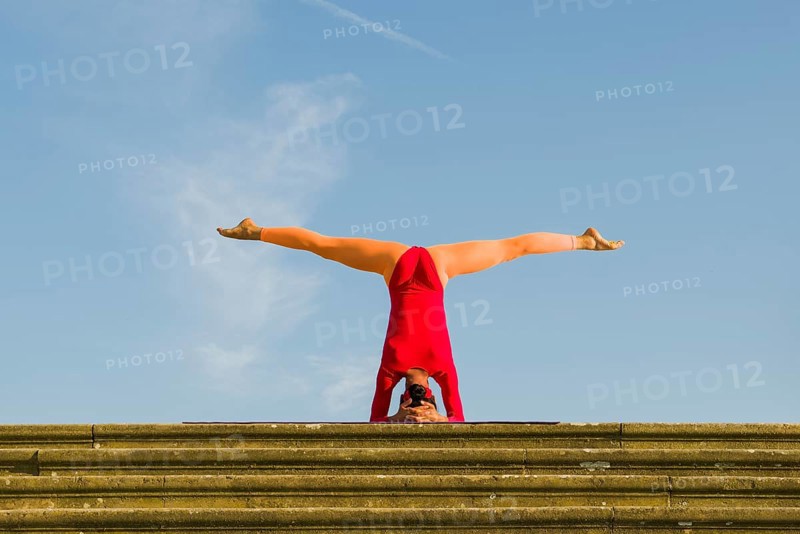 Young woman practising Hatha yoga