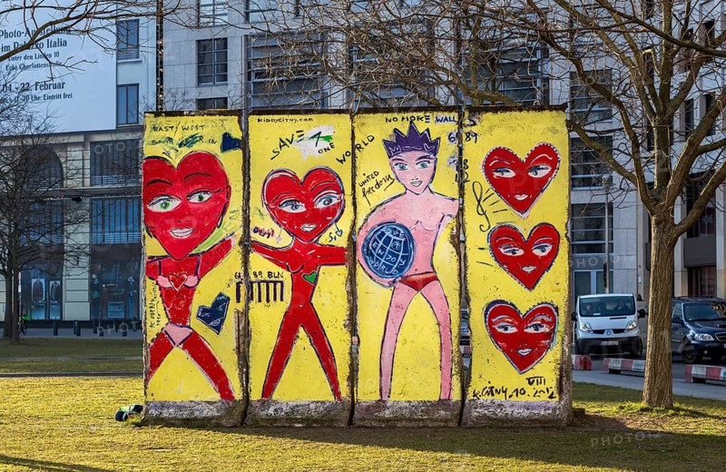 Artistically painted wall segments on the lawn at Potsdamer Platz square