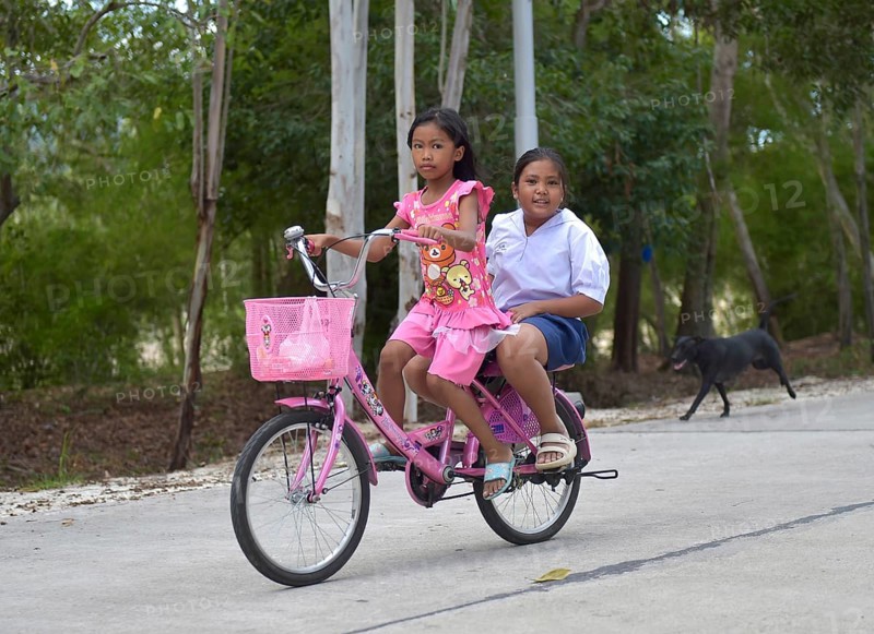 Two girls on a bike