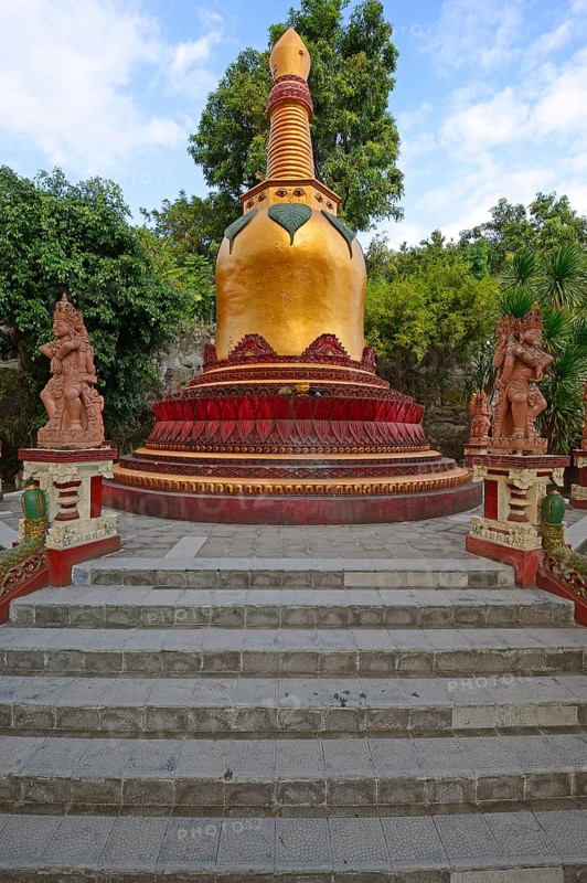 Golden pagoda in the outdoor area of the Buddhist monastery Brahma Vihara