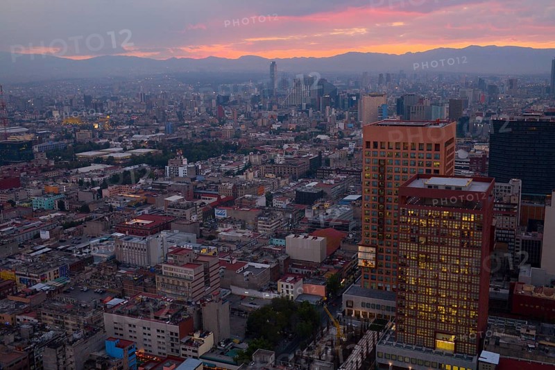 View across of the city at sunset