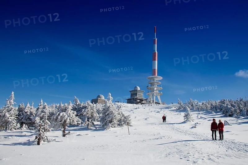Radio transmission tower and snow-covered trees on Mt Brocken