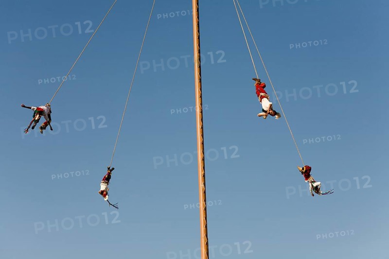 Voladores performing at a village festival