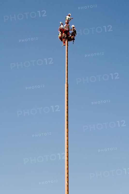 Voladores performing at a village festival