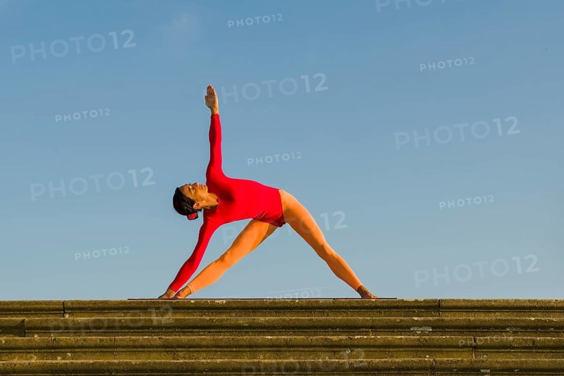 Young woman practising Hatha yoga