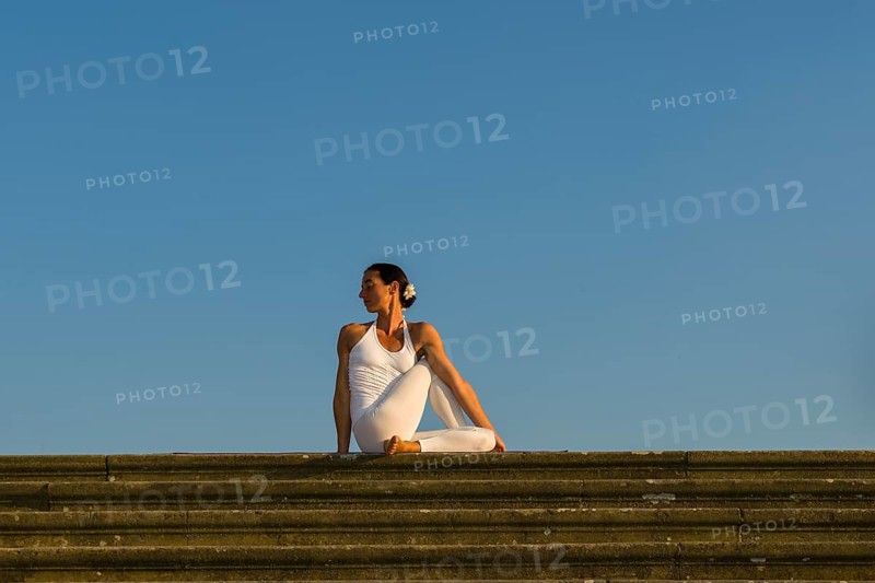 Young woman practising Hatha yoga