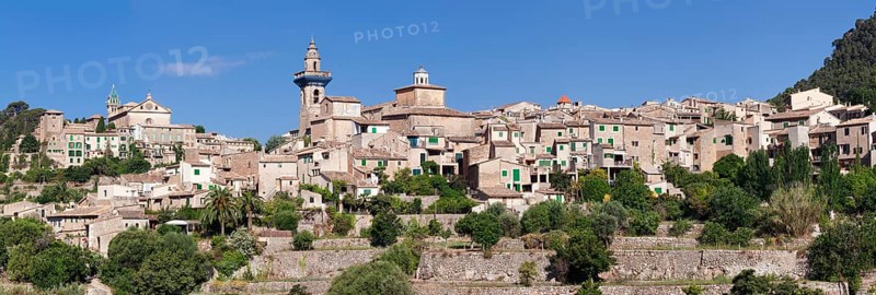 Valldemossa with the Carthusian Valldemossa Charterhouse and the parish church of Sant Bartomeu