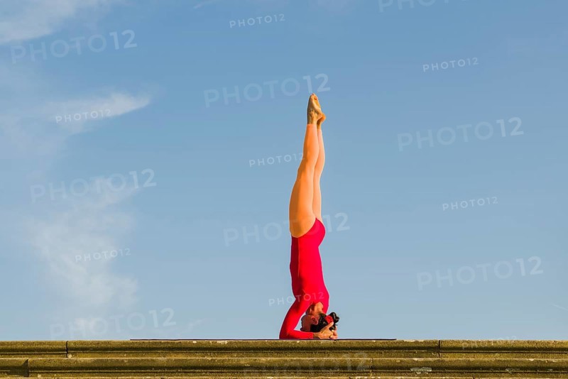 Young woman practising Hatha yoga