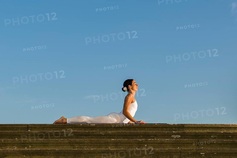 Young woman practising Hatha yoga