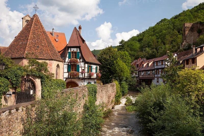Oberhof Chapel and half-timbered houses on the river Weiss
