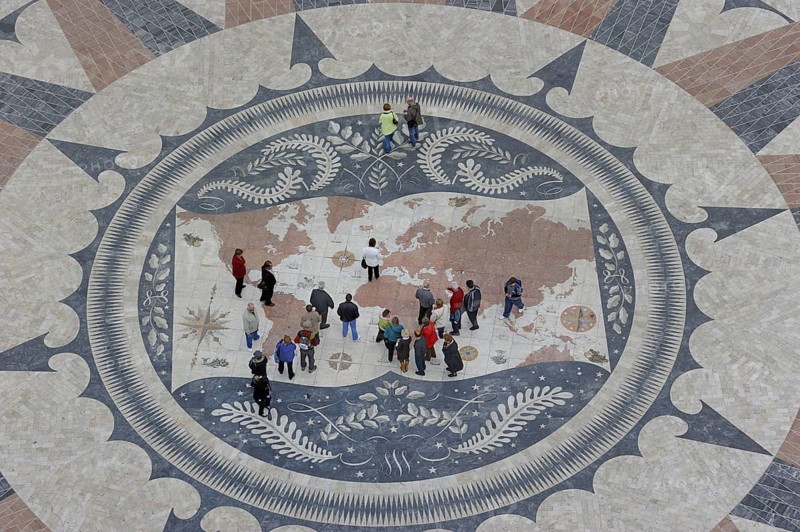 Compass rose with world map in the pavement in front of the Padrao dos Descobrimentos