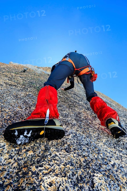 Climber climbing on a rock wall
