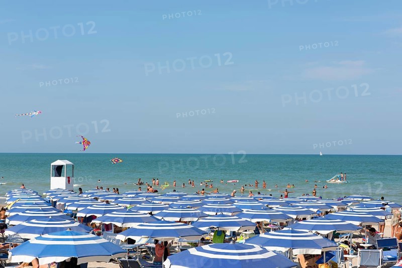 Bathers and parasols on the beach