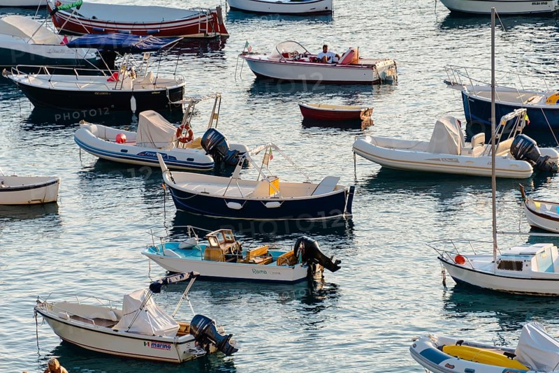 Fishing boats and inflatables in the sea