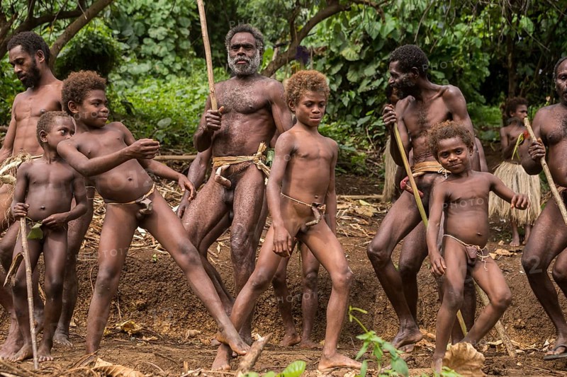 Men and boys of the Sa people dancing at the Land diving ceremony