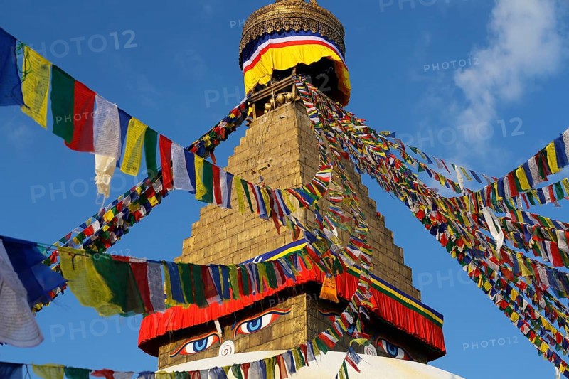 Eyes under the prayer flags