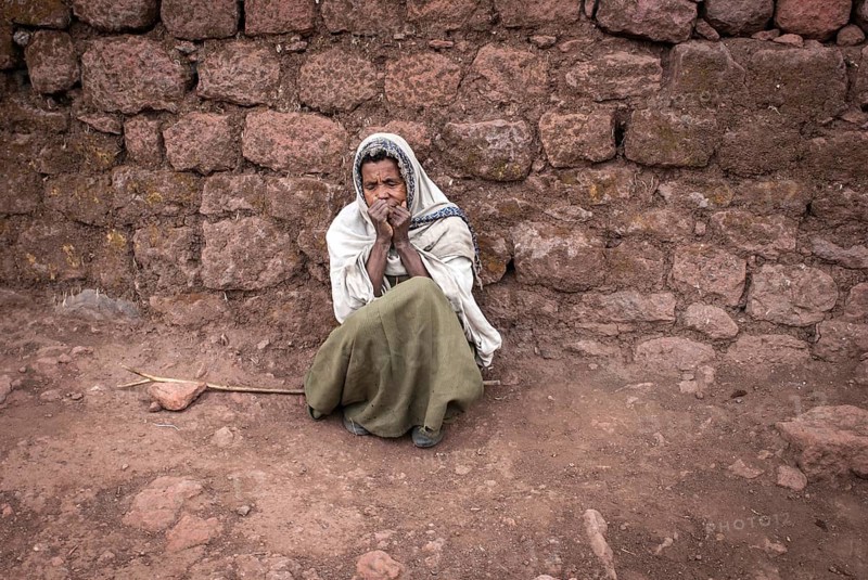 Woman begging for alms
