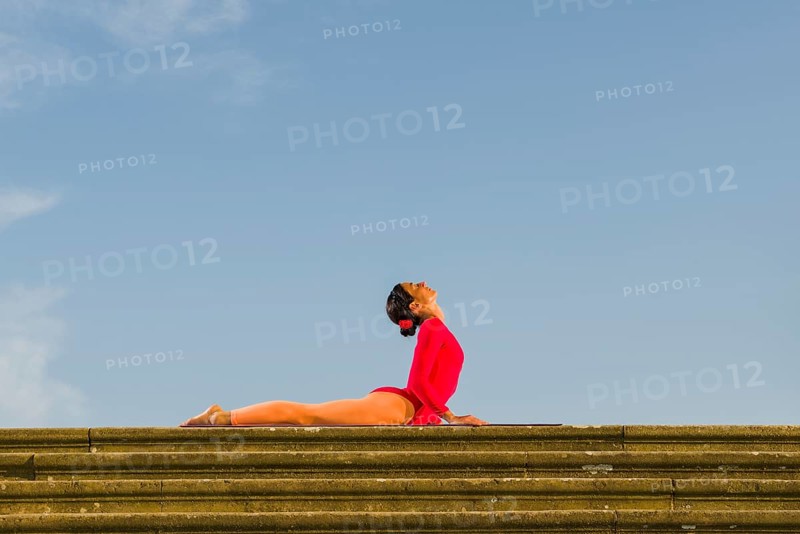 Young woman practising Hatha yoga