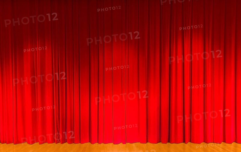 A curtain in dark red