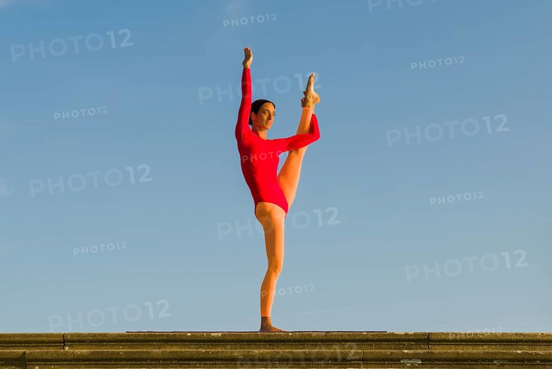 Young woman practising Hatha yoga
