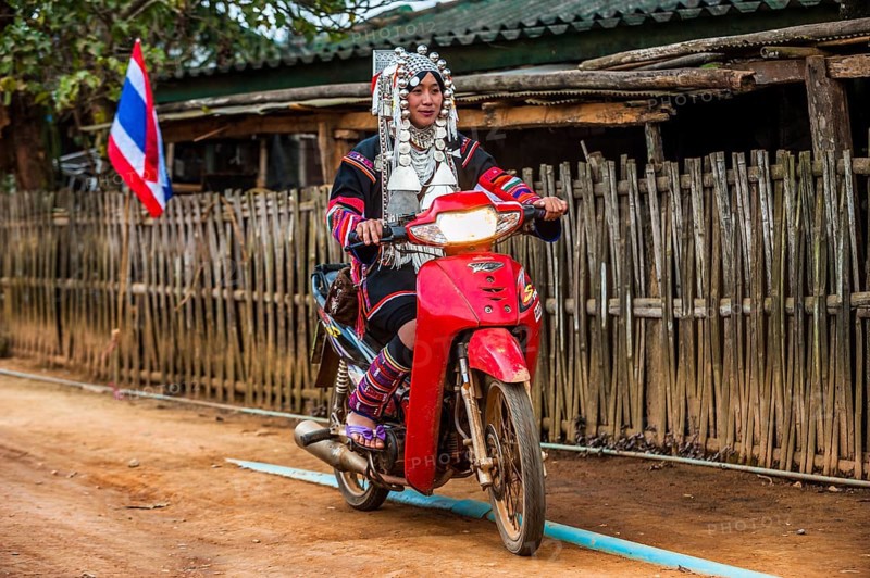 Traditionally dressed young woman from the Akha people