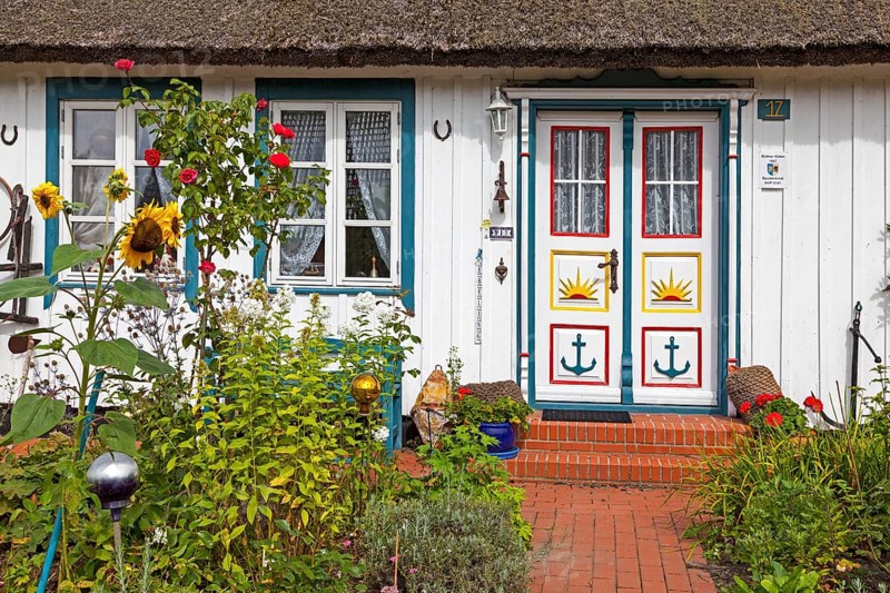 Typical house entrance with bench