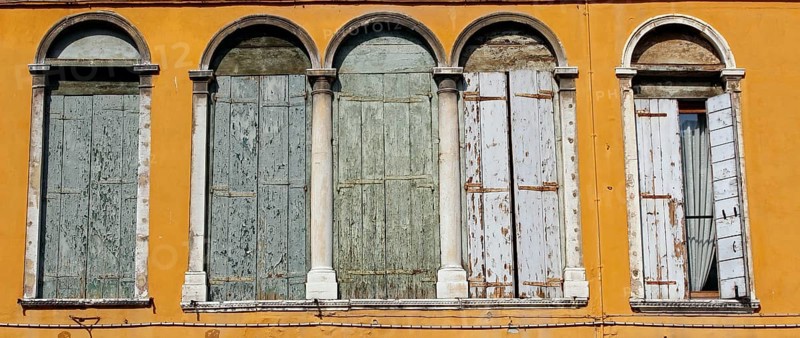 Shuttered Palladian windows