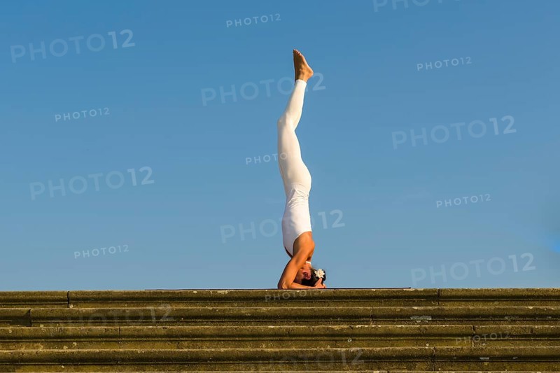 Young woman practising Hatha yoga