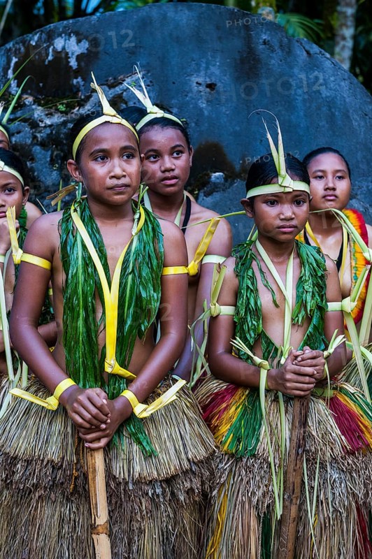 Traditionally dressed islanders