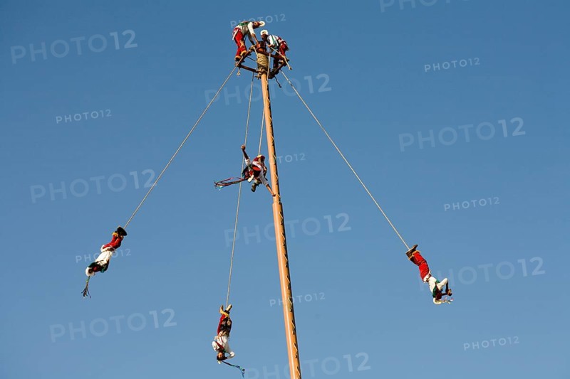 Voladores performing at a village festival