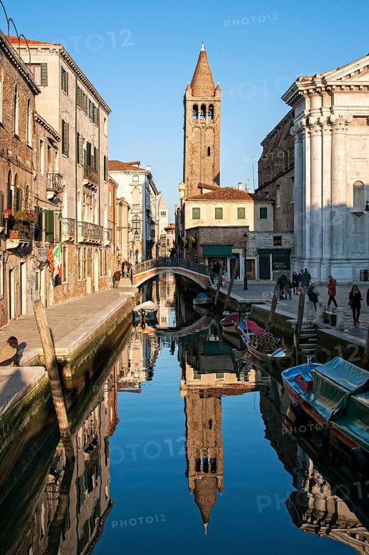 Rio de San Barnaba canal with reflections in the evening light