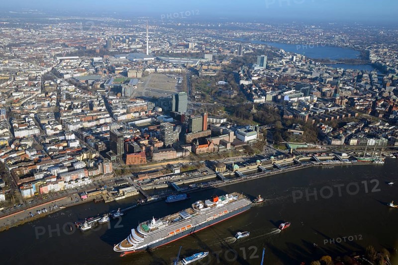 Cruise ship Queen Victoria on the Elbe in front of the city center with television tower and Alster