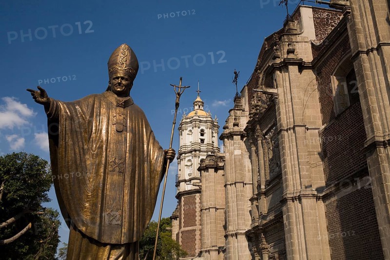 Statue of John Paul II next to the old Basilica of Our Lady of Guadalupe