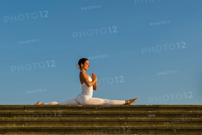 Young woman practising Hatha yoga