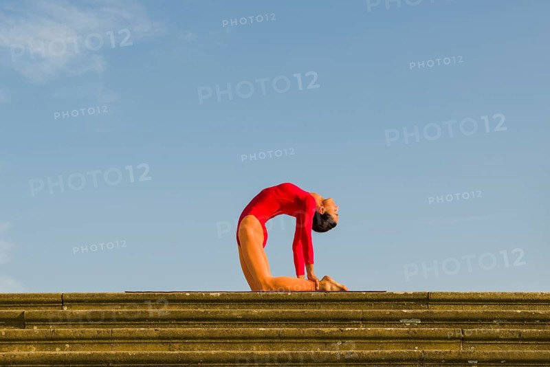 Young woman practising Hatha yoga