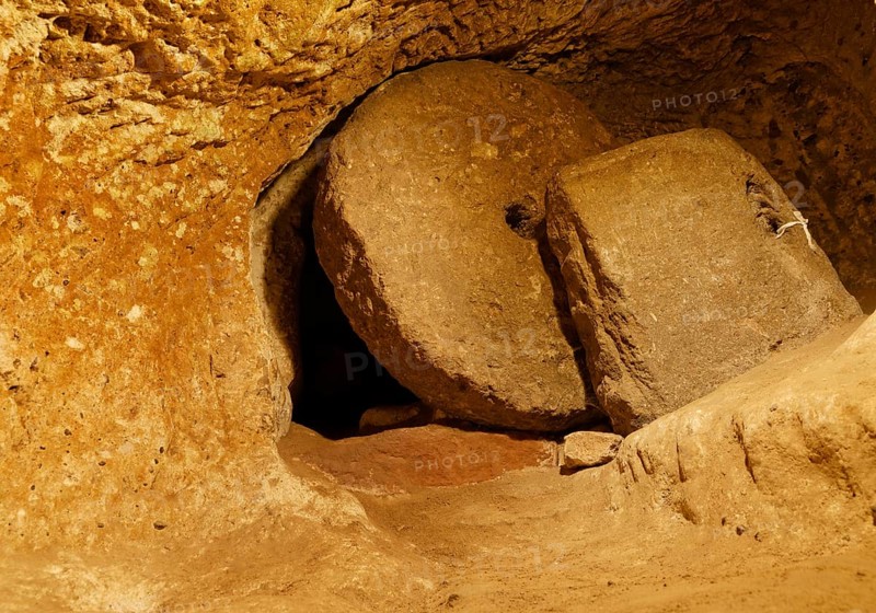 Door with a rolling stone
