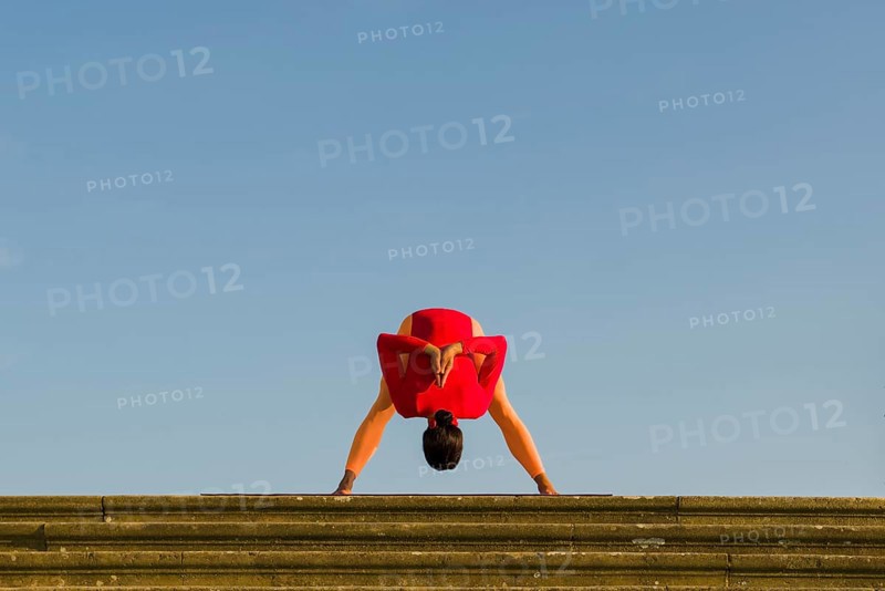 Young woman practising Hatha yoga