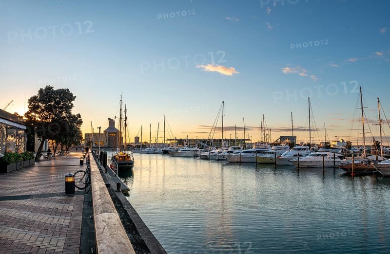 Promenade at the harbour at sunset
