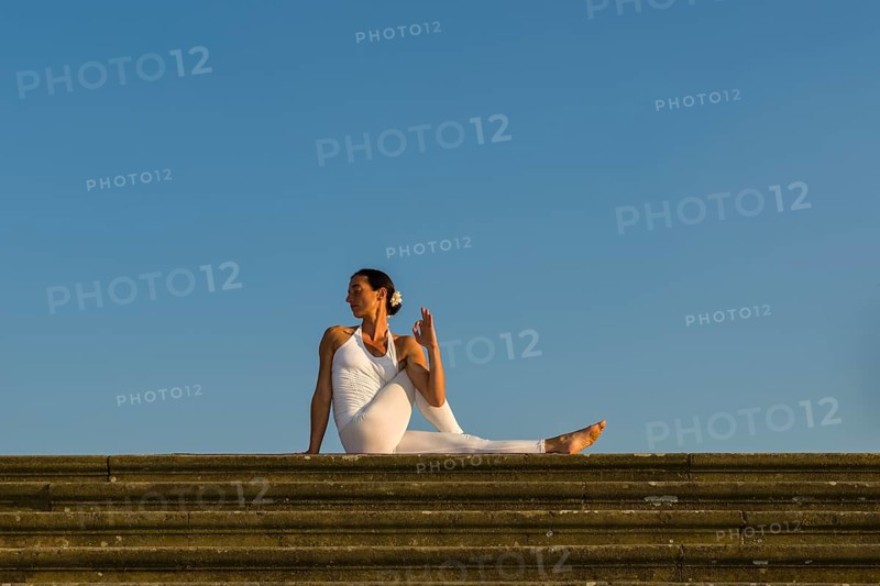 Young woman practising Hatha yoga