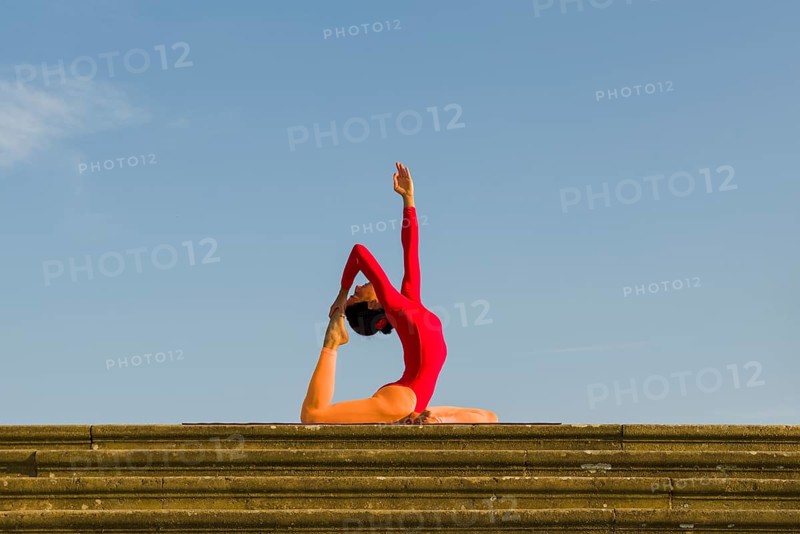 Young woman practising Hatha yoga