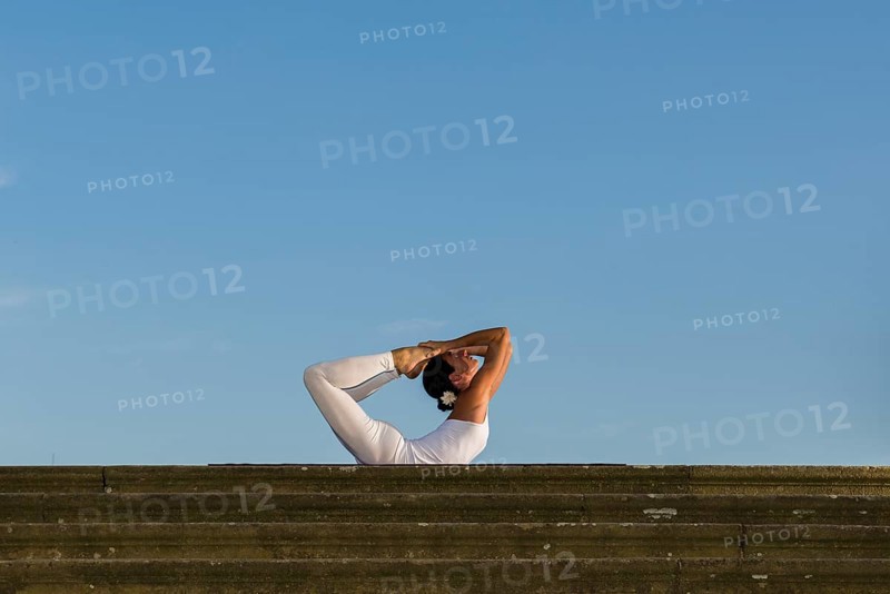 Young woman practising Hatha yoga