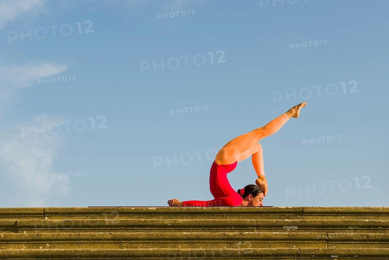 Young woman practising Hatha yoga