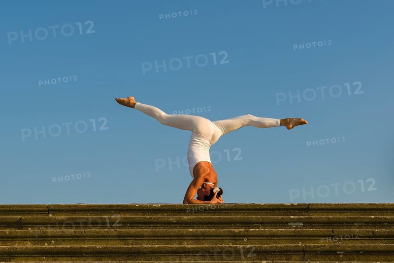 Young woman practising Hatha yoga