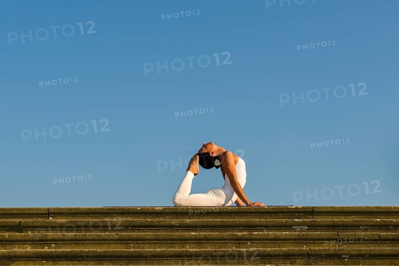 Young woman practising Hatha yoga