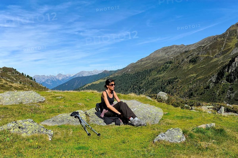 Woman resting after a mountain hike