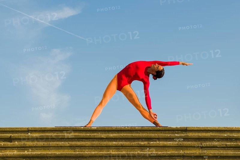 Young woman practising Hatha yoga