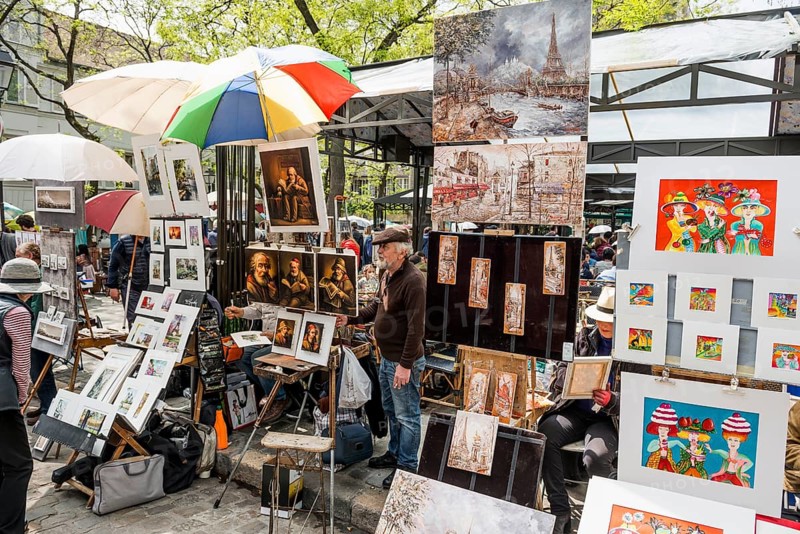 Painter sells pictures at Place du Tertre