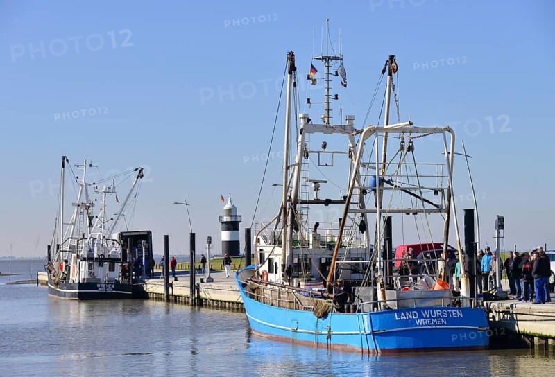 Cutters in the harbour with Kleiner Preusse or Little Prussian Lighthouse